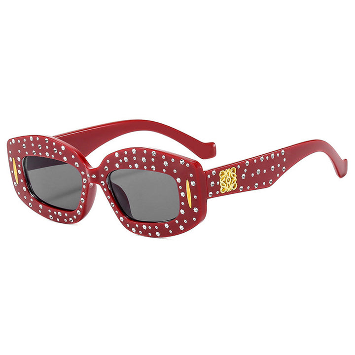Women striking sunglasses with glamorous rhinestone details Stornfield