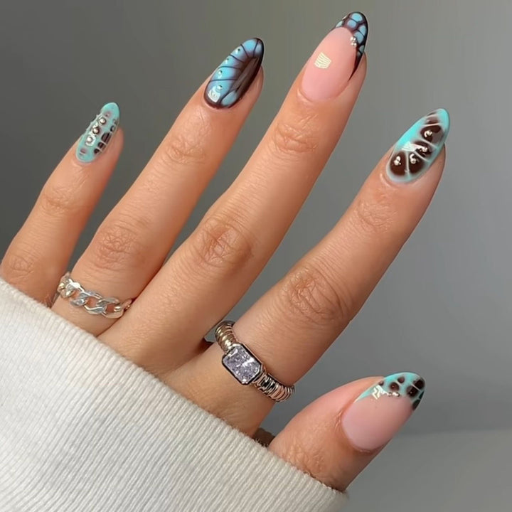 Artistic Butterfly-Inspired Nail Art Extensions Stornfield