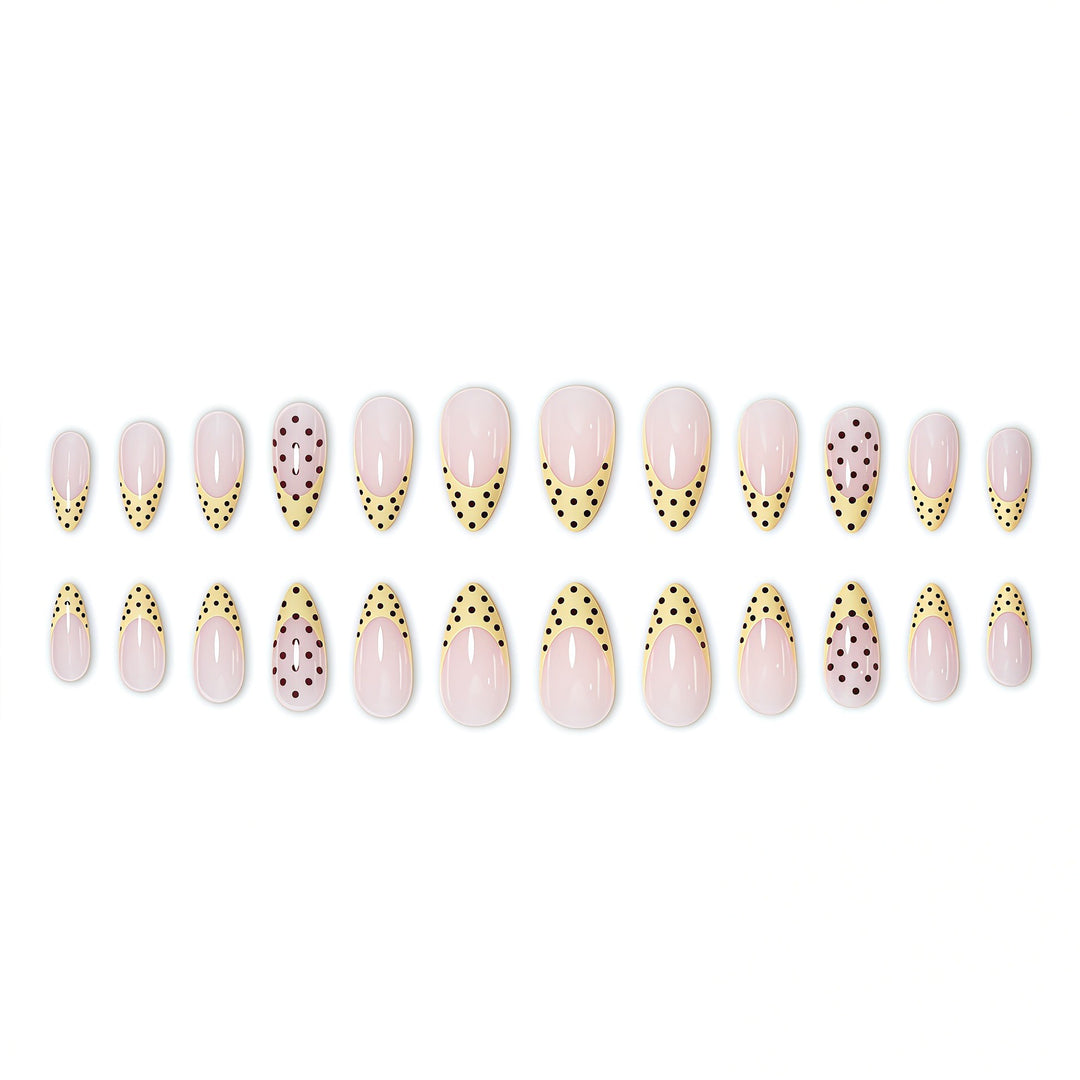 Elegant French Tip Nail Enhancements with Polka Dot Design Stornfield