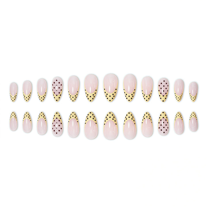 Elegant French Tip Nail Enhancements with Polka Dot Design Stornfield