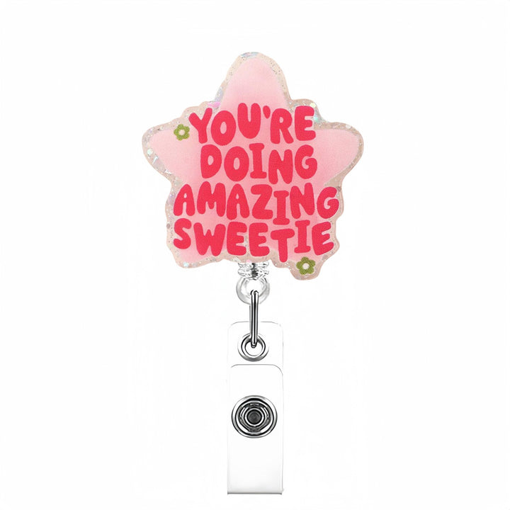 Expandable badge holder with anatomical heart pendant