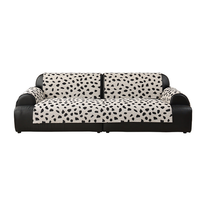 Sofa protection cover set with non-slip underside and dalmatian pattern