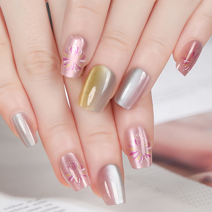 Artificial nails in modern ombre design with floral accents Stornfield