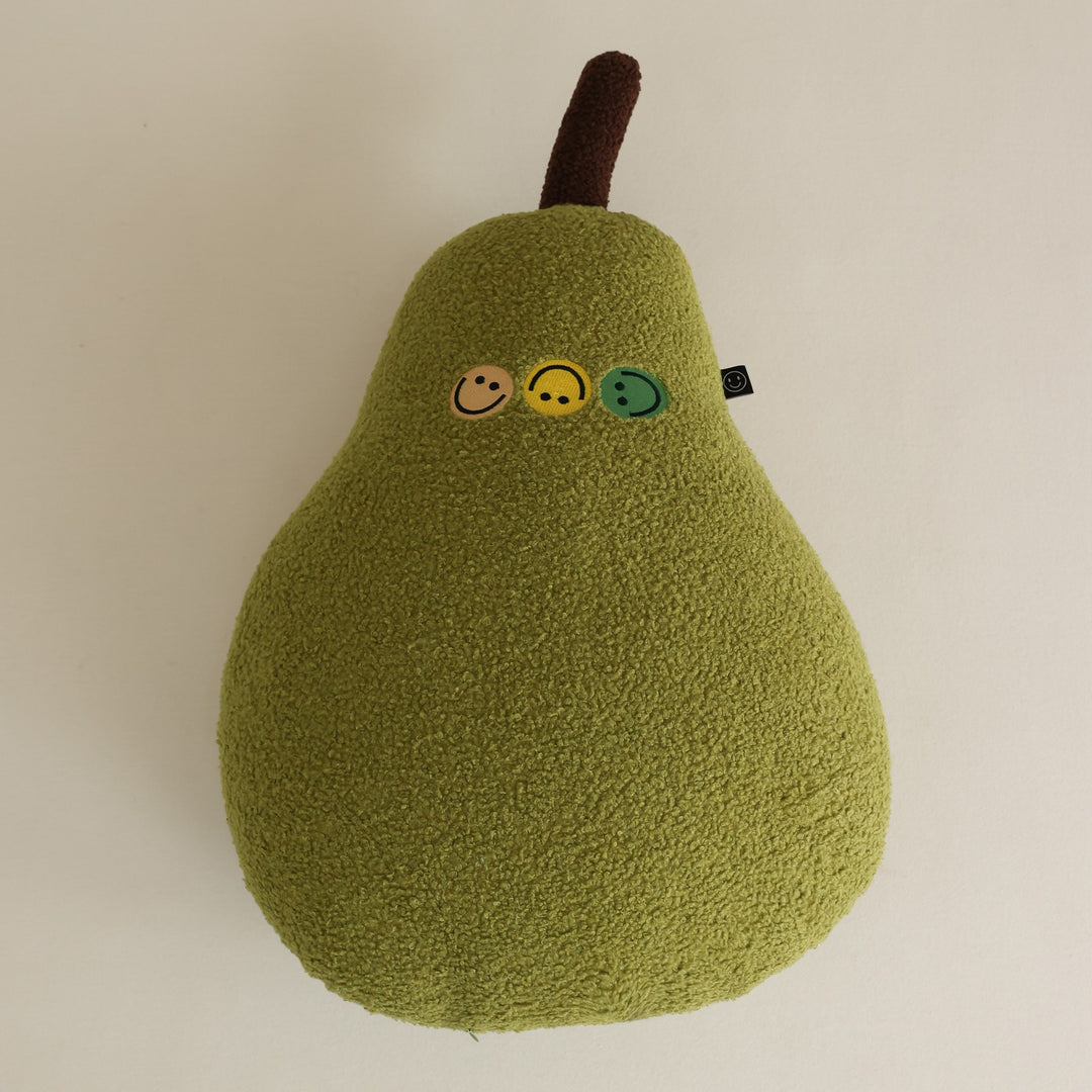 Pillow in pear shape made of teddy fleece with applied smileys