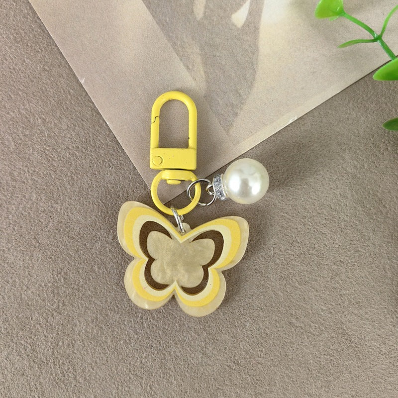 Keychain with butterfly and pearl accent Stornfield