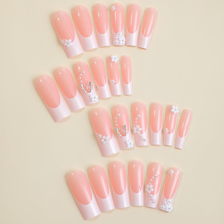 Nail art set with charming flower and butterfly accents Stornfield