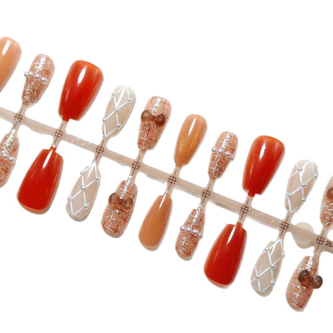 Artificial nails with elegant pearl decorations Stornfield