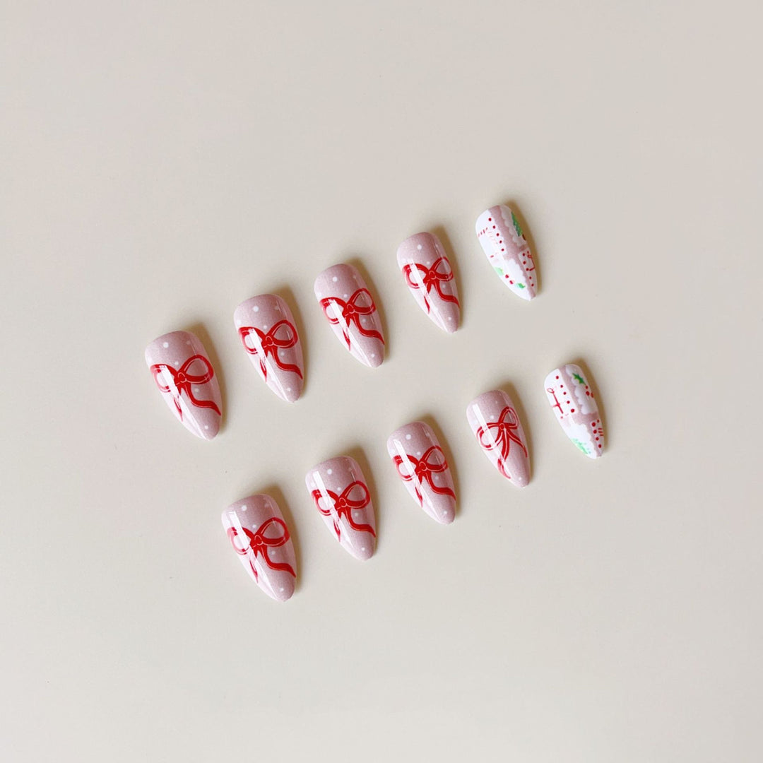 Artificial nail set with festive gift and bow motifs Stornfield