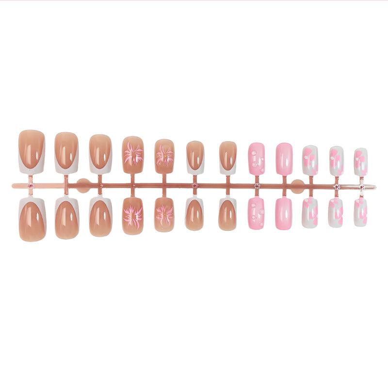 Acrylic nail set with floral and glamorous design Stornfield