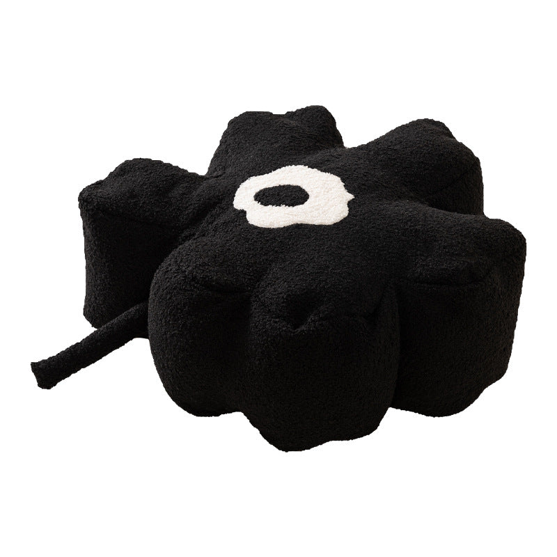 Flower-shaped floor seat pouf with boucle cover and segmented padding