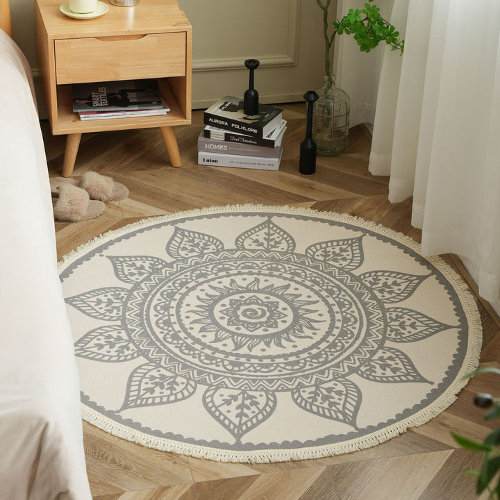 Round woven rug with mandala motif, flat cotton-jute mix and fringes Stornfield