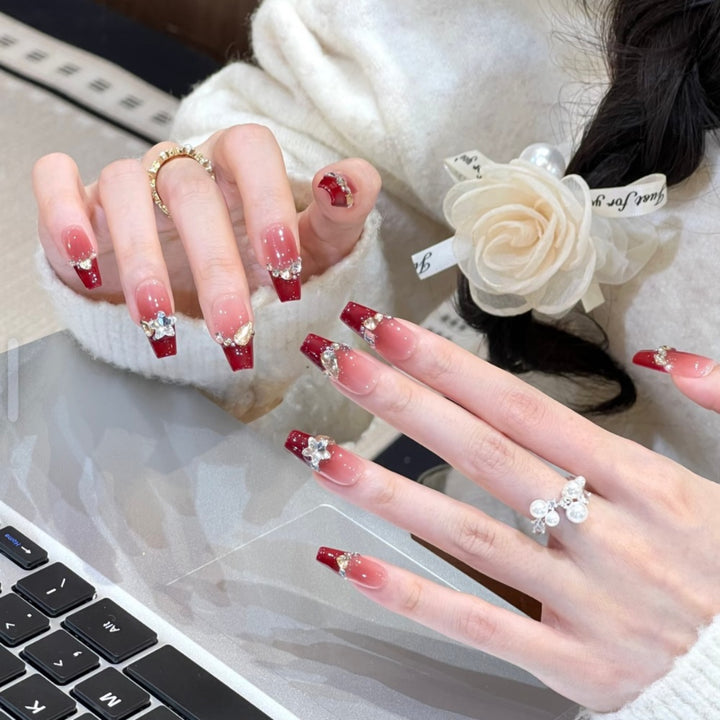 Glamorous artificial nails with elegant rhinestone design Stornfield