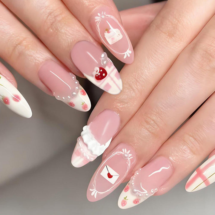 Artificial nail set with playful flowers and elaborate decorations Stornfield