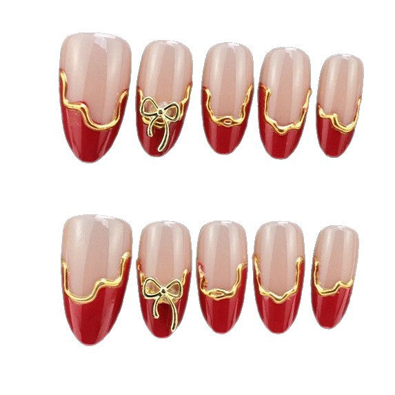Fake nail set with flower and gold details Stornfield