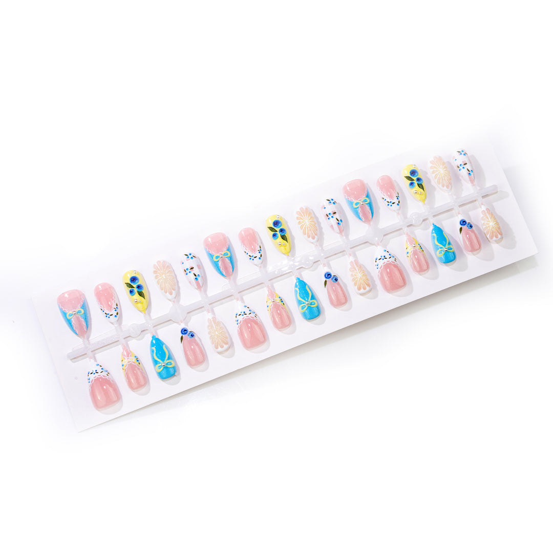 Artistic Press-On Nail Art Set with Floral and Bow Designs Stornfield