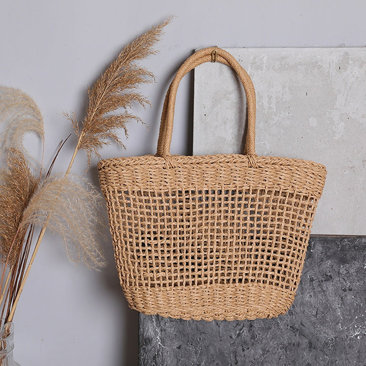 Basket bag made of natural raffia with sturdy carrying handles Stornfield