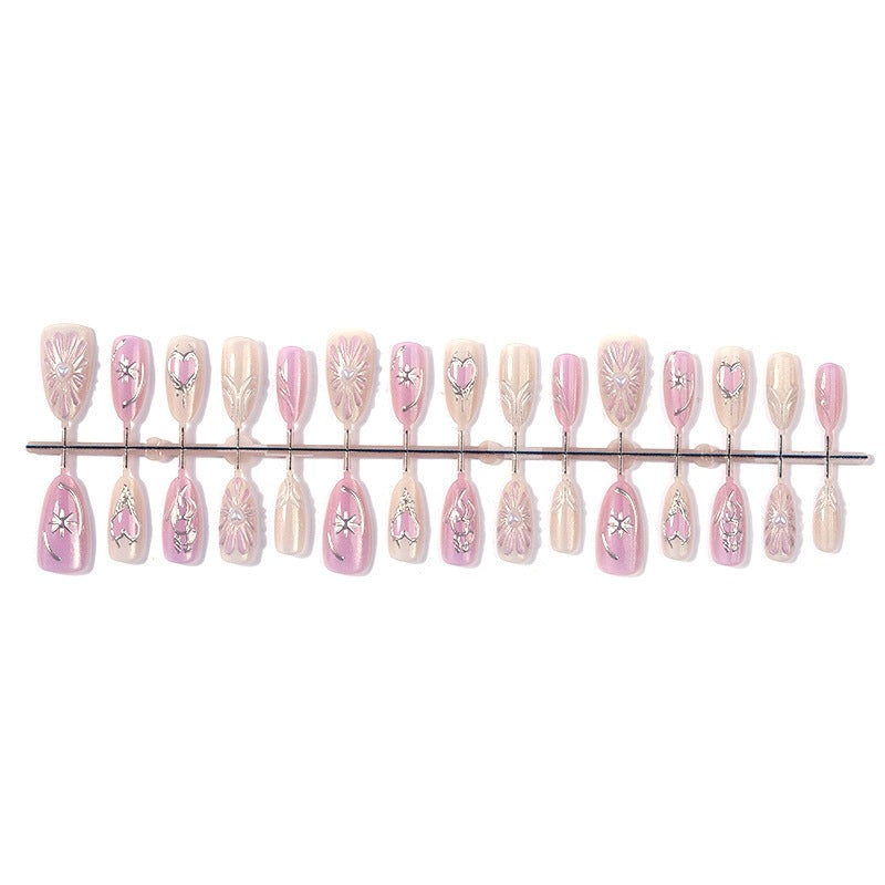 Artificial nail set with floral accents and glittering details Stornfield
