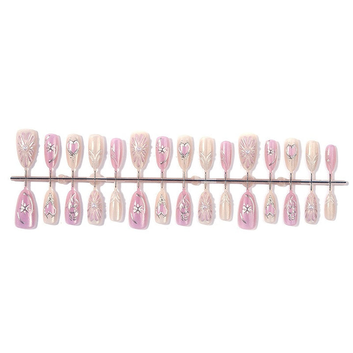 Artificial nail set with floral accents and glittering details Stornfield