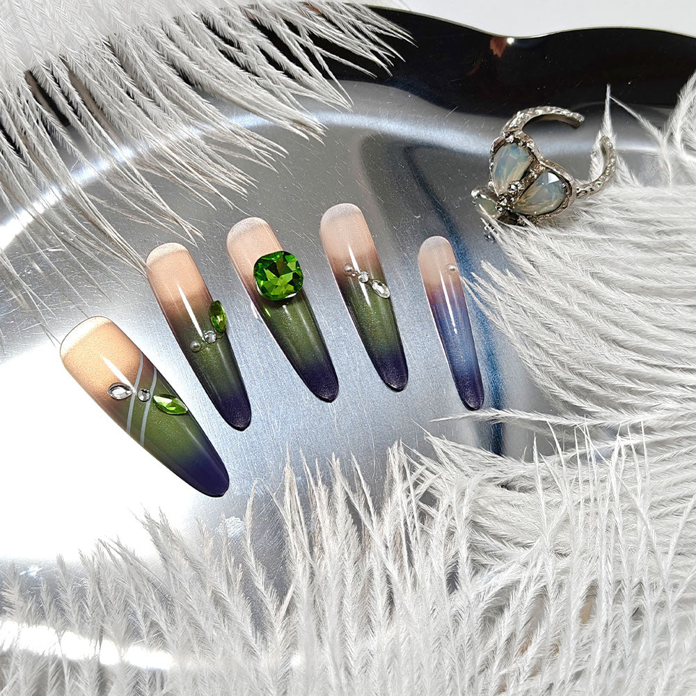 Artifical nails with elegant ombre design and sparkling accents Stornfield