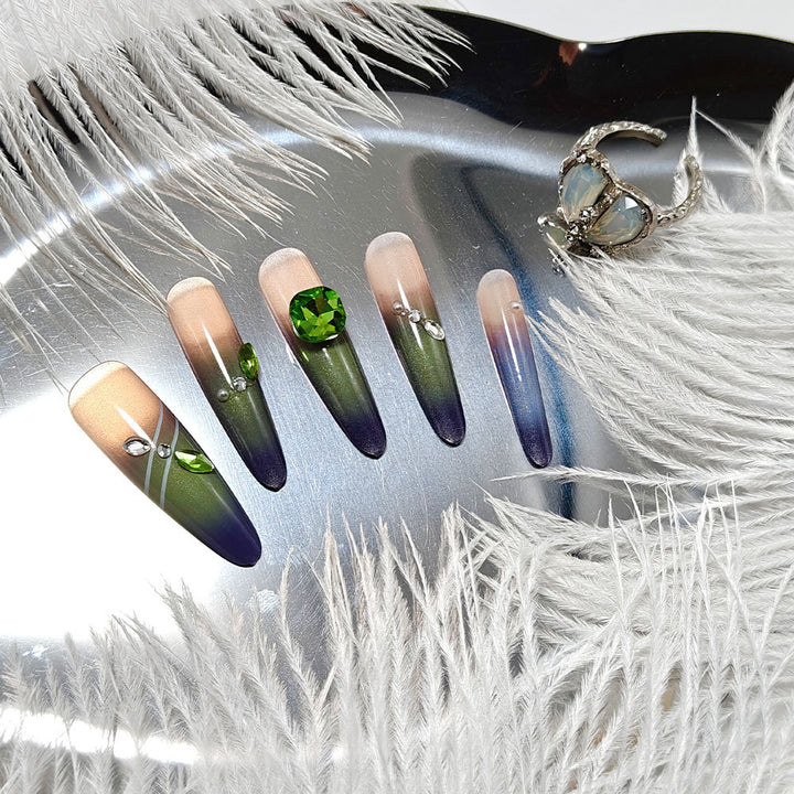 Artifical nails with elegant ombre design and sparkling accents Stornfield