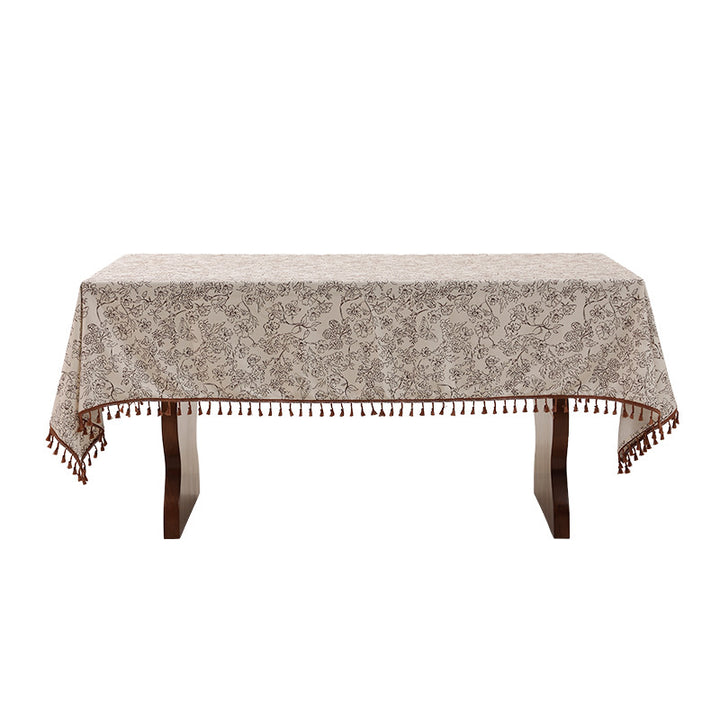 Tablecloth made of cotton blend fabric with floral jacquard look and tassel trim Stornfield