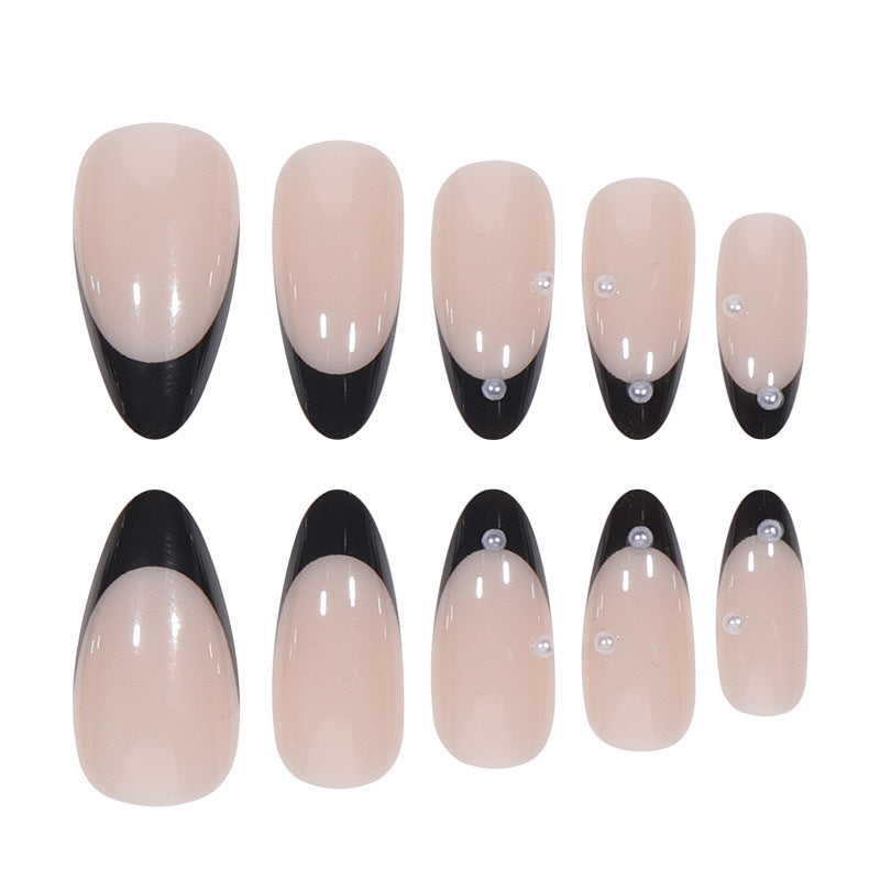 Artificial nail set with glossy French design and delicate 3D accents Stornfield