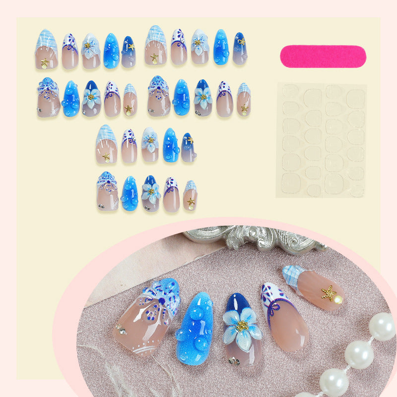Artificial nail set with maritime motifs and floral design Stornfield