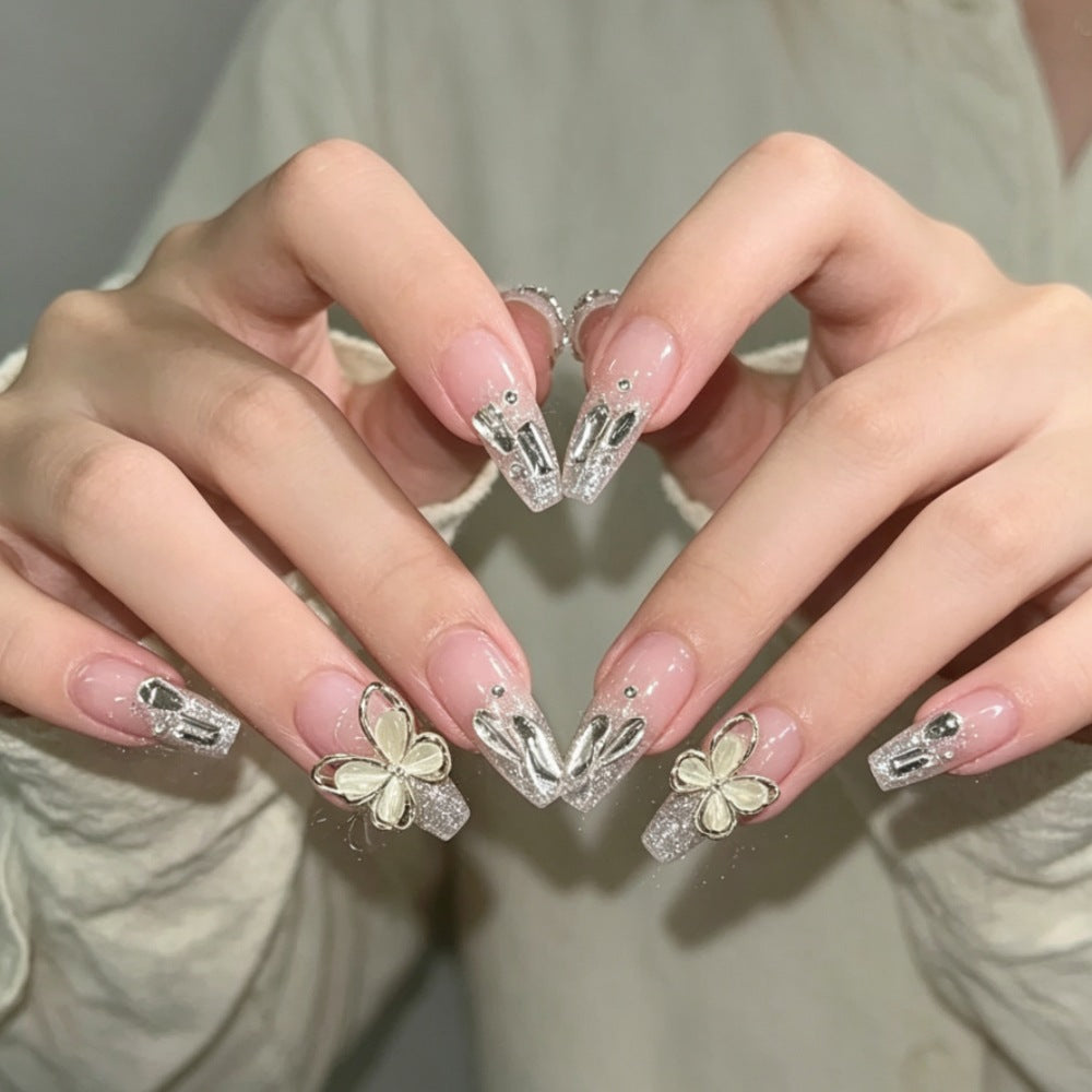 Glamorous Press-On Nail Set with Floral and Glitter Accents Stornfield