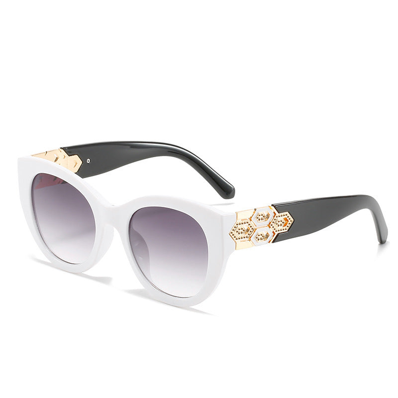 Fashion-Forward Cat-Eye Sunglasses with Decorative Accents Stornfield