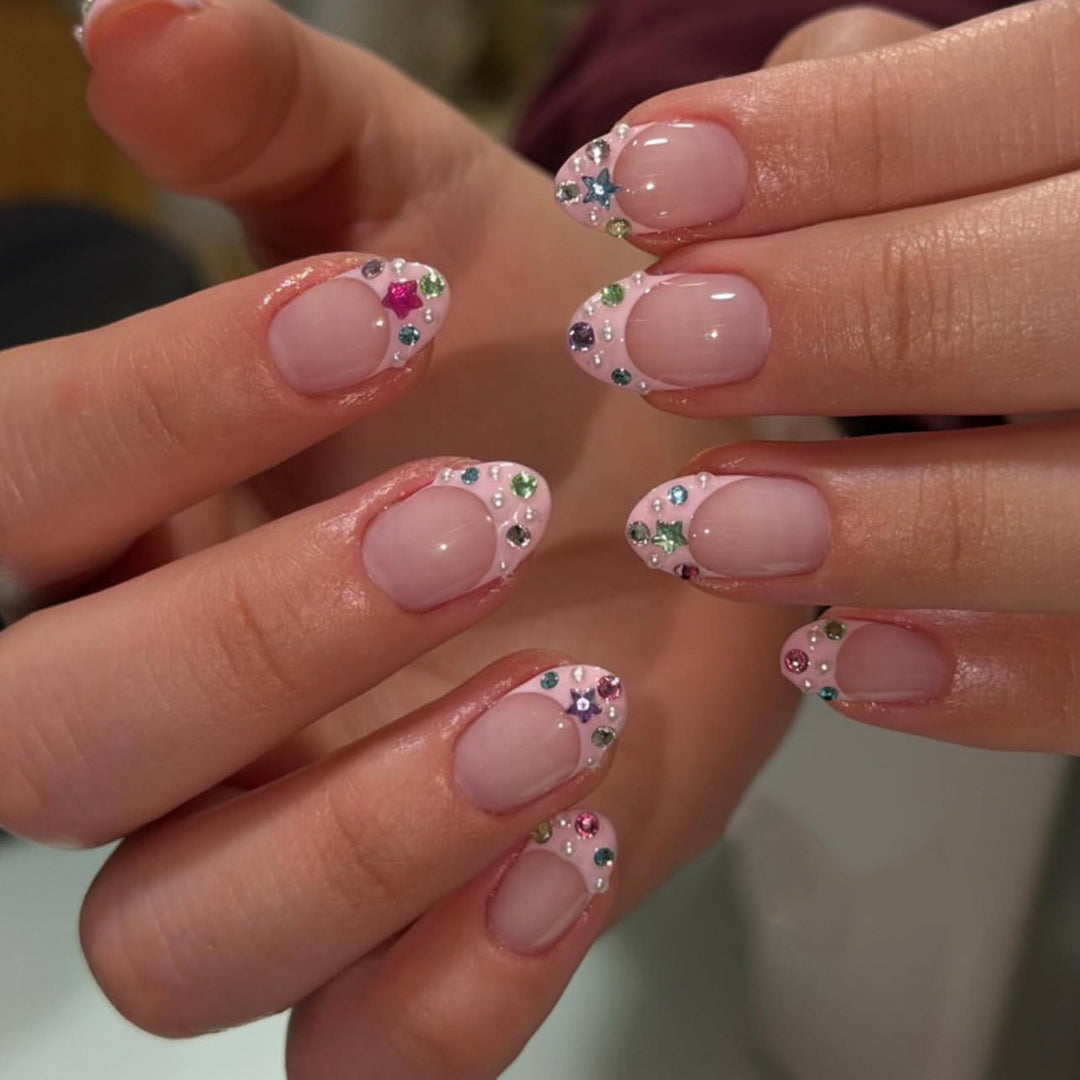 Artful stiletto nails with glitter accents Stornfield