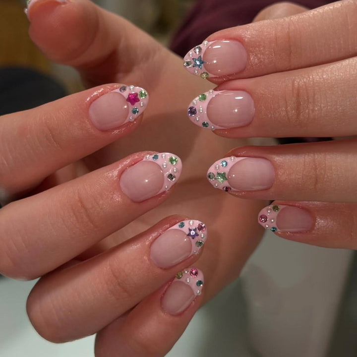 Artful stiletto nails with glitter accents Stornfield