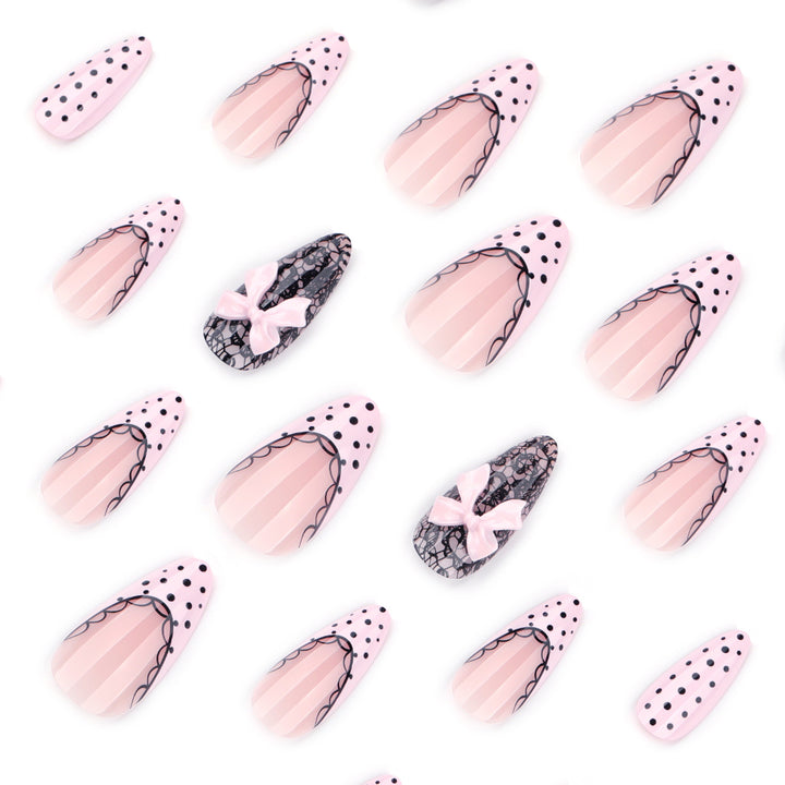Elegant and artistic stiletto nails with tips and bows Stornfield