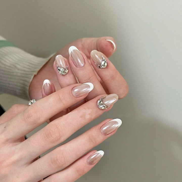 Glamorous artificial nails with elegant rhinestone decorations Stornfield