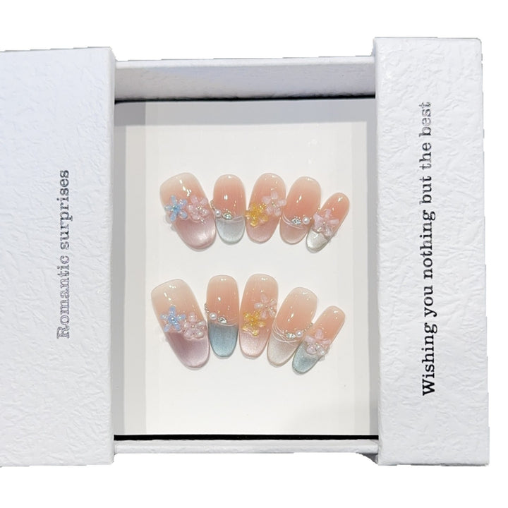Romantic artificial nails with floral accents Stornfield