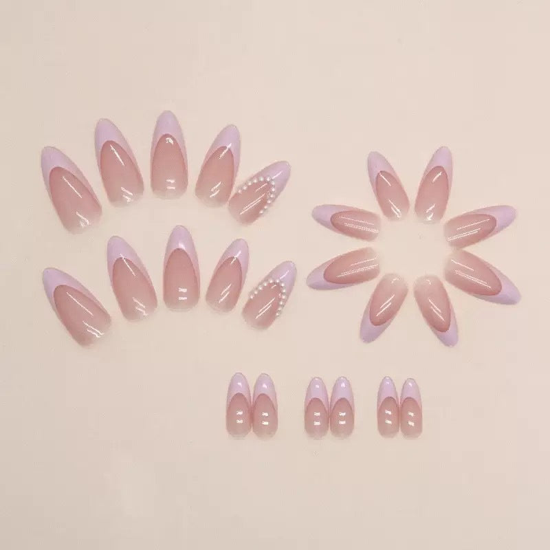 Elegant artificial nail tips with glitter and pearl decorations Stornfield