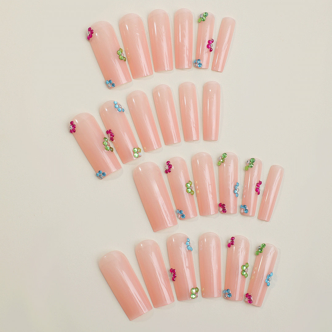 Artificial nail tips with colorful flower accents Stornfield