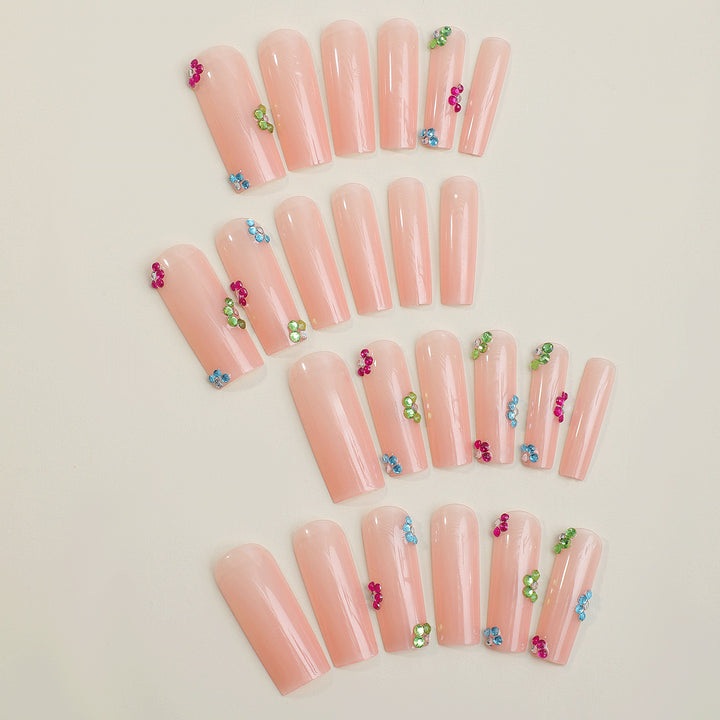 Artificial nail tips with colorful flower accents Stornfield