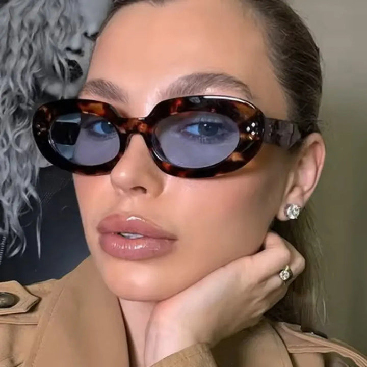 Ladies fashionable sunglasses with unique oval frame and protective lenses Stornfield