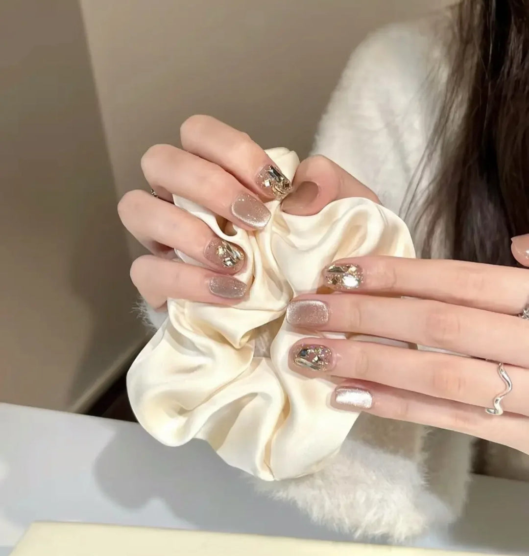 Elegant artificial nails with sparkling gold accents Stornfield