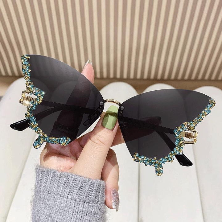 Women's extravagant sunglasses with sparkling butterfly design Stornfield
