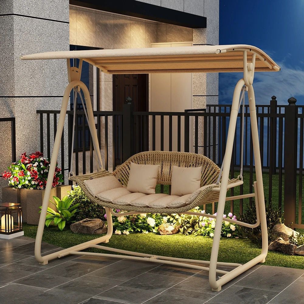 Woven rattan outdoor swing loveseat with padded cushions and powder-coated steel frame Stornfield