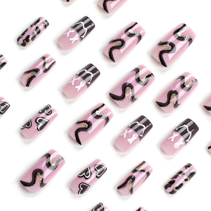Artful nail extensions in elegant design with gold accents Stornfield