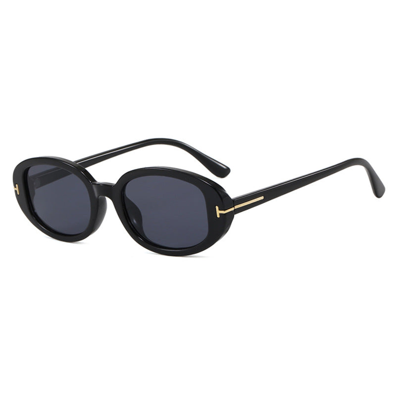 Ladies stylish oval sunglasses with golden details Stornfield