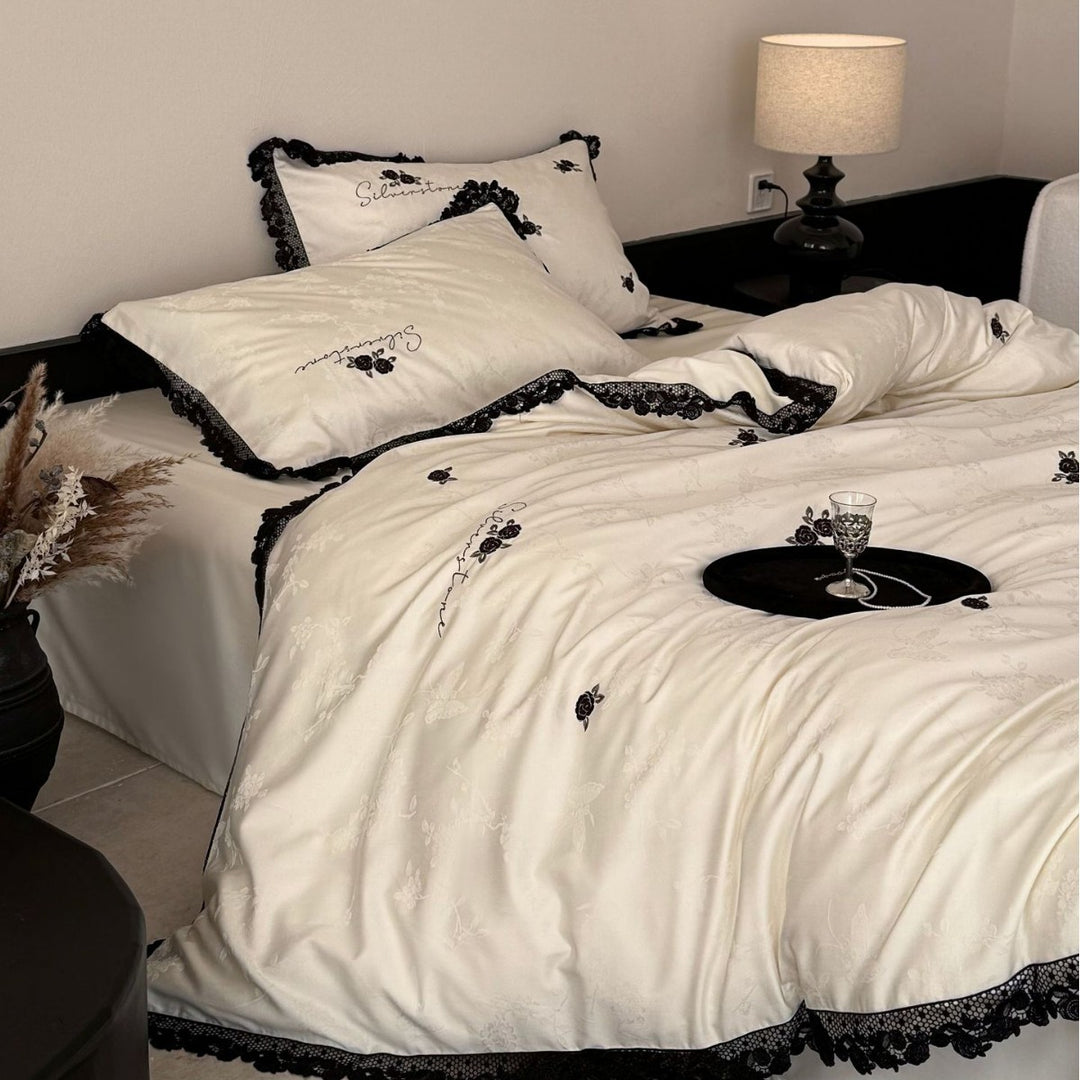 Luxurious cotton satin bedding set with lace border and rose embroidery