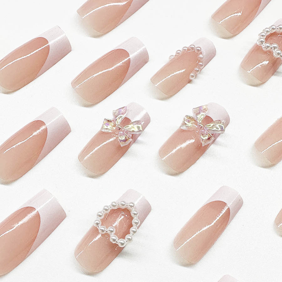 Acrylic nail set with elegant pearl and 3D flower decorations Stornfield
