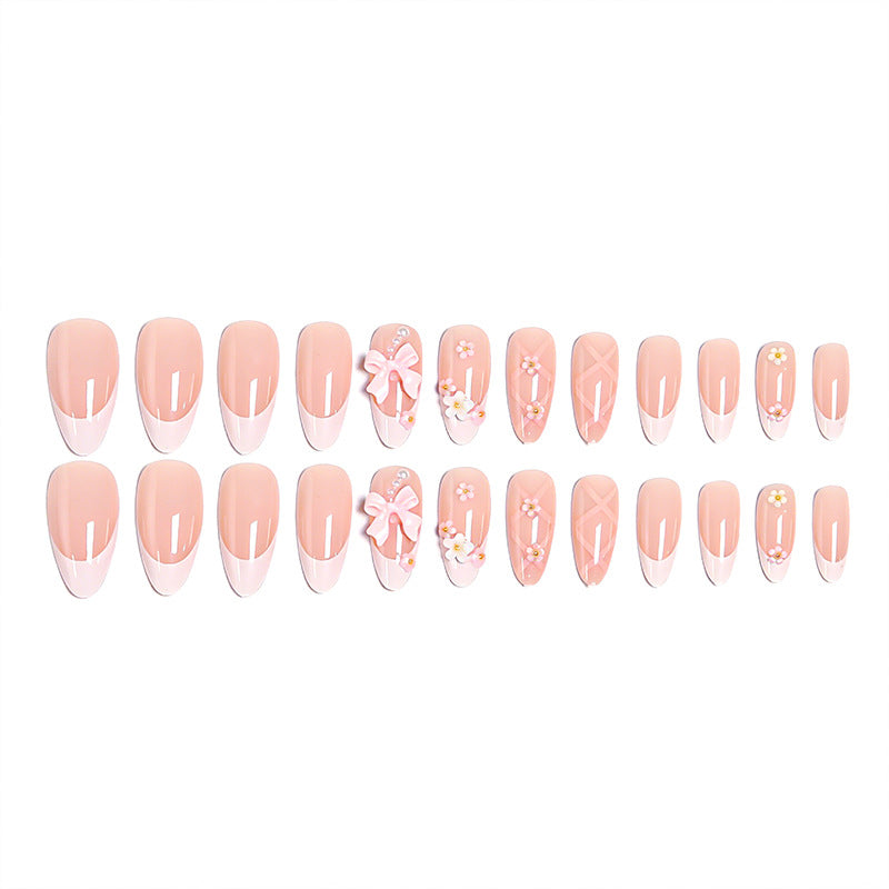 Artful Nail Tips with Ribbons and Floral Decorations Stornfield