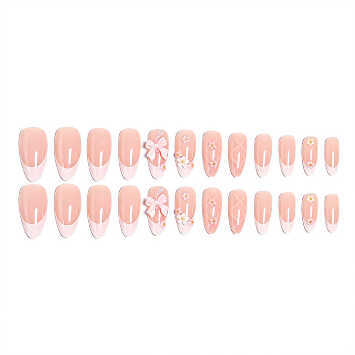 Artful Nail Tips with Ribbons and Floral Decorations Stornfield
