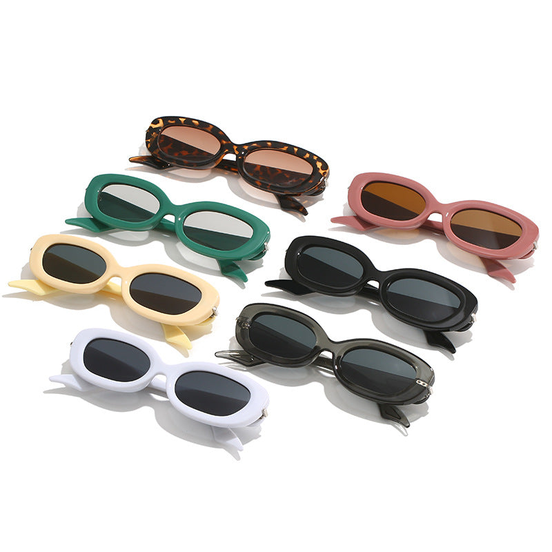 Ladies stylish sunglasses with elegant, curved frame Stornfield