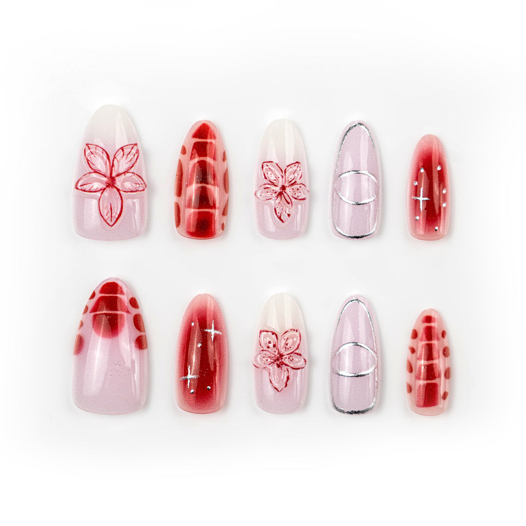 Artificial nails with floral accents and modern patterns Stornfield