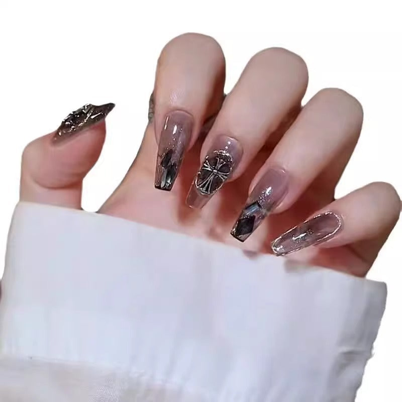 Glamorous artificial nails with heart design and glittering accents Stornfield